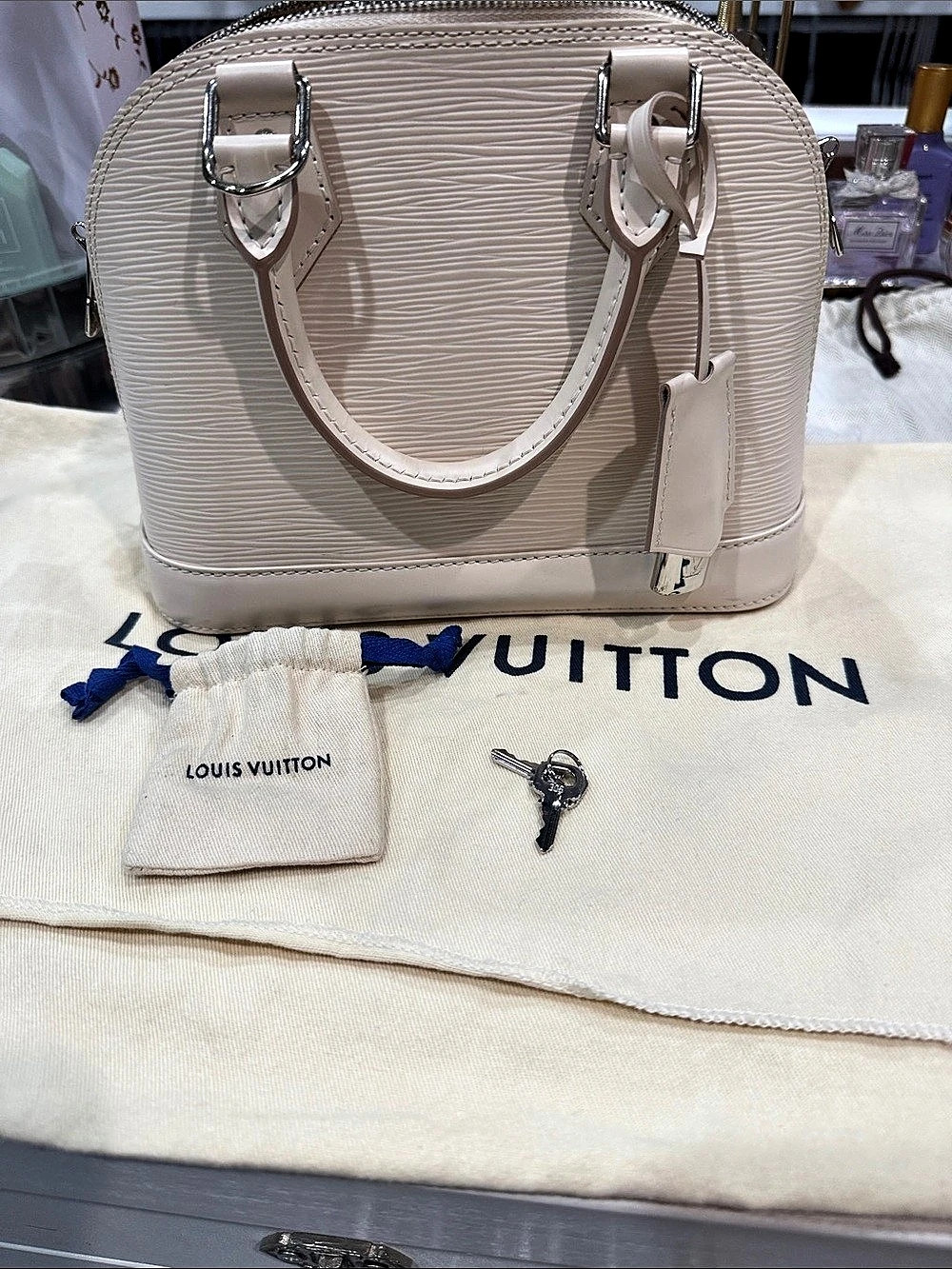 Louis Vuitton Alma BB Epi Leather Satchel in Cream White